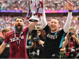 Mile Jedinak and John Terry with the SKy Bet Play-Off trophy at Wembley, GOAL