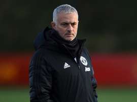 Jose Mourinho watches on as his Manchester United players train. GOAL