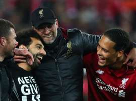 Jurgen Klopp with Mo Salah and Virgil Van Dijk. GOAL