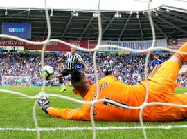 Etheridge saved Kenedy's penalty in the dying minutes of the game. Goal