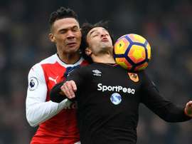 Kieran Gibbs (left) vies with Lazar Markovic. Goal