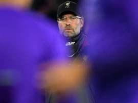 Klopp a hermit amid Liverpool title hype.