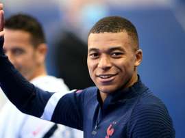 Kylian Mbappe arrives to attend a training session. GOAL