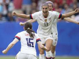 USA return home with Women's World Cup trophy, and champagne, in hand