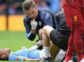 Sane off injured in first half of Community Shield. GOAL