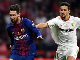 Lionel Messi and Jesus Navas.
