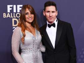 Messi, com a sua mulher. Goal