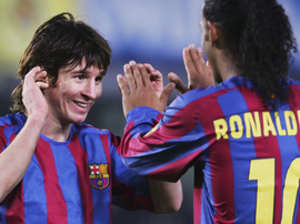 Ronaldinho veut que Messi joue. AFP