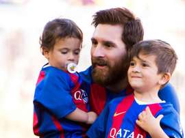 Thiago (right) is the eldest of Messi's children, and takes a keen interest football. GOAL