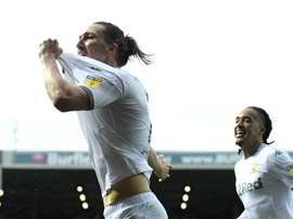 Ayling strikes to get Leeds back on track for Premier League return. GOAL
