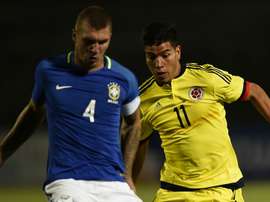 Lyanco (left) in action with Brazil's under-20 national team. Goal