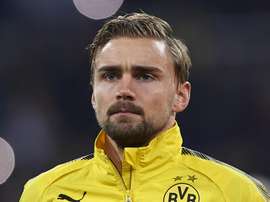 Stoger said Schmelzer's absence was a 'sporting decision'. GOAL