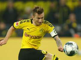 Marco Reus has still not returned to training since picking up a muscle injury. GOAL