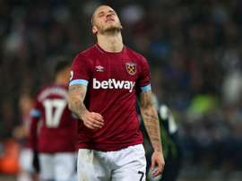 'Irons' forward Arnautovic will be missing for some time. GOAL