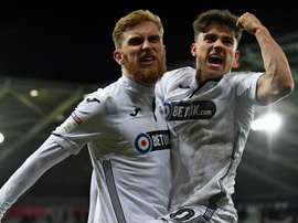 Championship Review: Late drama rescues draws for Swansea and Bolton.