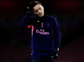 Ozil and Ramsey will miss BATE clash. GOAL