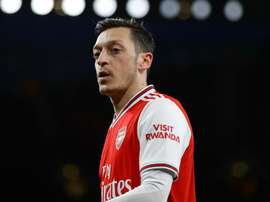 Mesut Ozil will miss Arsenal's Europa League match at Olympiakos. GOAL
