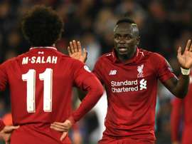 Salah is back in the side for Liverpool's game with Bournemouth while Mane drops to the bench. GOAL
