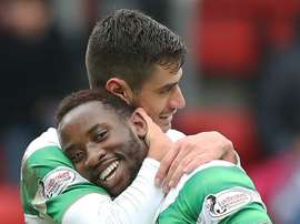 Moussa Dembele celebrating his hat-trick. Goal
