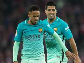 Suarez says Pique's comments about Neymar's arrival should be taken with a pinch of salt. GOAL