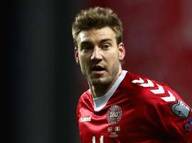 An injury has put paid to Bendtner's World Cup hopes. GOAL