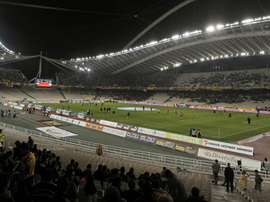 AEK Athens fans were caught throwing flares towards Ajax supporters. GOAL