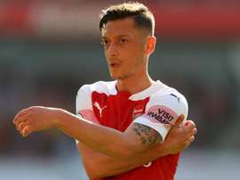 Ozil has missed Arsenal's last few games. GOAL