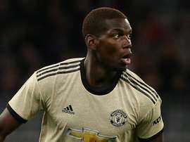 Pogba urged to get his head down by Manchester United legend Robson. GOAL
