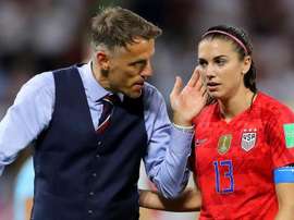 Phil Neville (L) is proud of his team and says they are closing the gap on the USA. GOAL