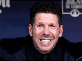 Morata defends Simeone