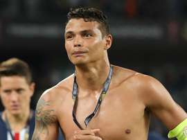 Lesionado, Thiago Silva não enfrenta o Dortmund na Liga dos Campeões. AFP