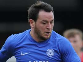 Tomlin on target to deny high-flying Owls. GOAL