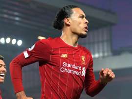 Van Dijk refuses to agree that title race is over. GOAL