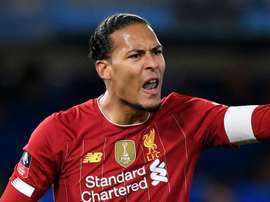 Van Dijk slams 'negative' critics after latest Liverpool loss. GOAL