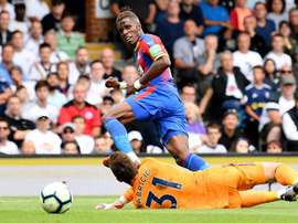 Zaha signed the new deal despite interest from Spurs. GOAL
