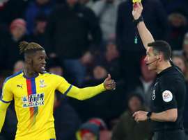 The Crystal Palace winger has been charged for his 'improper' reaction to red card. GOAL