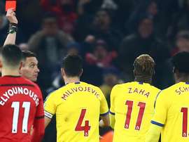 Zaha apologises for red card