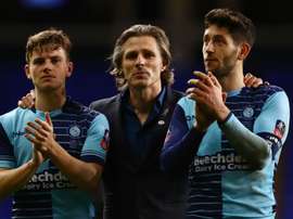Wycombe Wanderers players and their coach after the end of the match. Goal