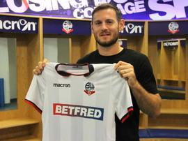 Grounds is an experienced left back. Twitter/OfficialBWFC