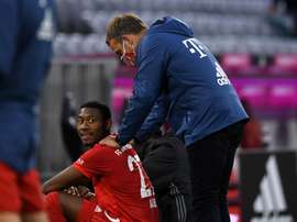 Hansi Flick with David Alaba who could soon leave. EFE