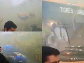 La hinchada de Tigres recibió al bus con un banderazo. Twitter/Jasoninho10