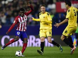 Le milieu de l'Atletico Madrid Thomas Partey (g), buteur face à Reus en Coupe du Roi. AFP