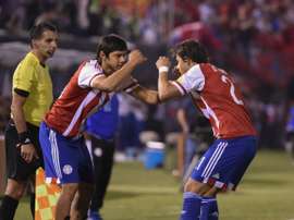 Los jugadores de Paraguay celebran uno de sus goles ante Chile. CONMEBOL