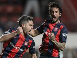 Matías Caruzzo marcó el primer gol de San Lorenzo ante Banfield. EFE/AFP