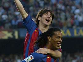 Messi et Ronaldinho célèbrent le premier but de l'Argentin. AFP