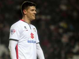 MK Dons striker Alex Revell stepped up for his side. MKDonsFC