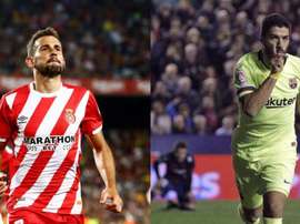 Stuani e Suárez na briga pela artilharia. EFE