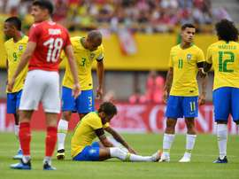 Neymar took a challenge to his ankle early on. AFP