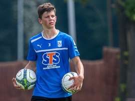 Polish centre-forward Dawid Kownacki has been linked to Premier League side Liverpool . LechPoznanFC