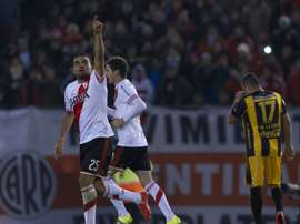 River Plate Gabriel Mercado (L) celebrates after scoring against Guarani during their Libertadores Cup semifinal first leg at the Monumental Antonio Vespucio Liberti stadium in Buenos Aires, on July 14, 2015